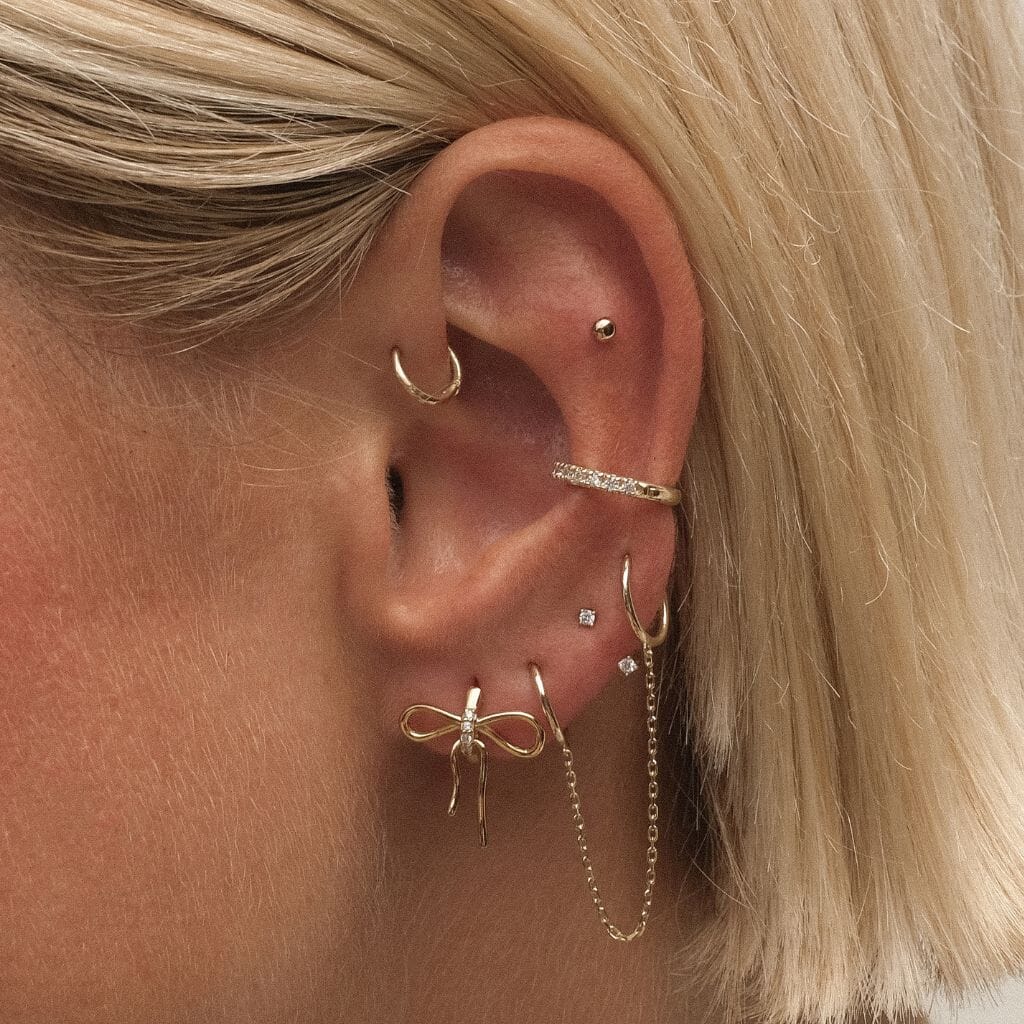 Mike diamond hoop piercing