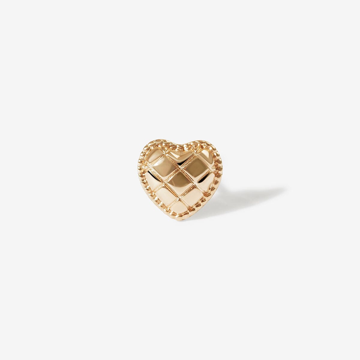 Collins heart quilted piercing