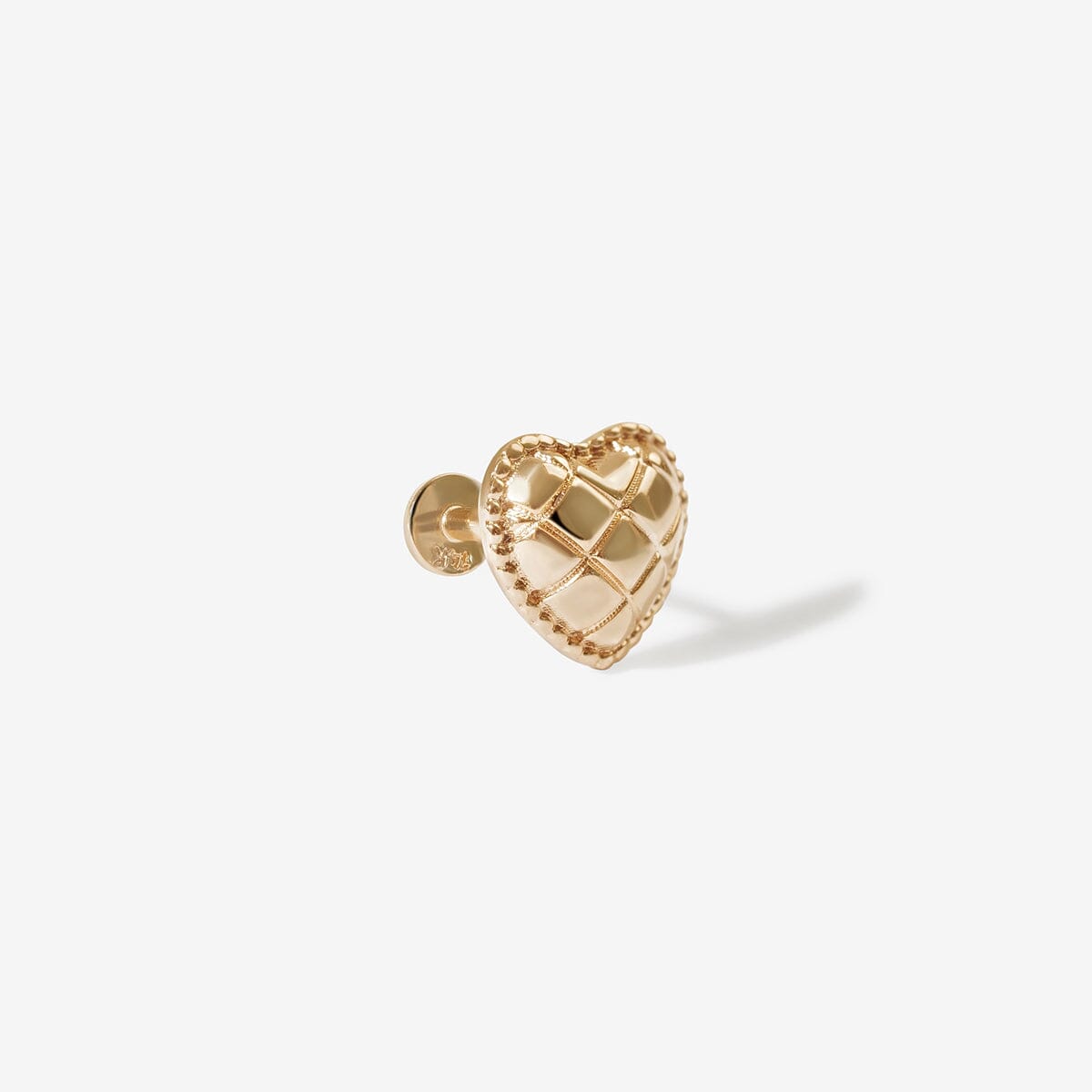 Collins heart quilted piercing