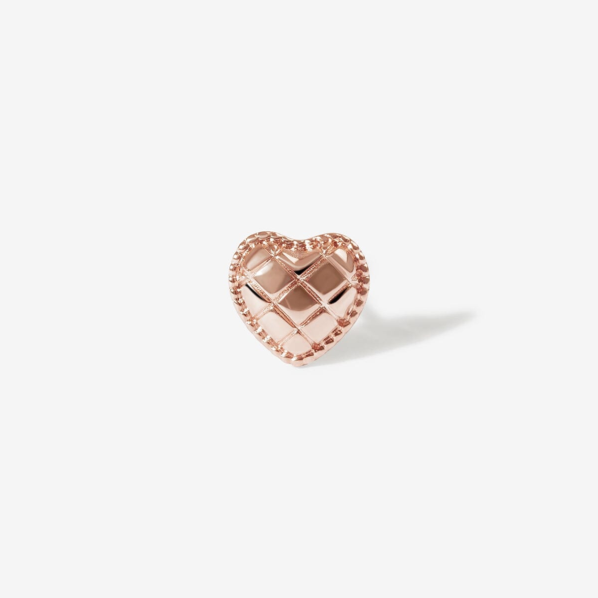 Collins heart quilted piercing