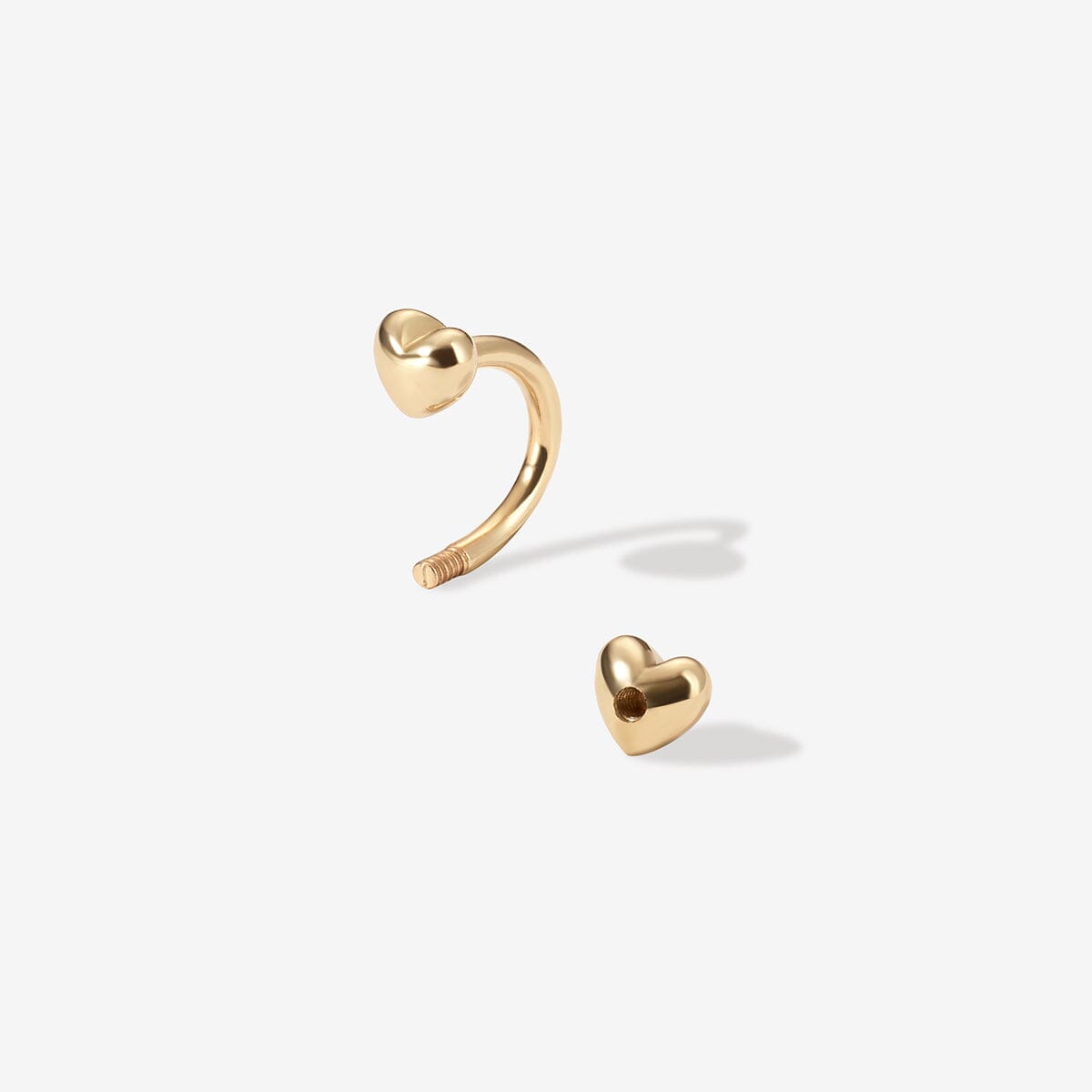 Fabio heart u hoop piercing