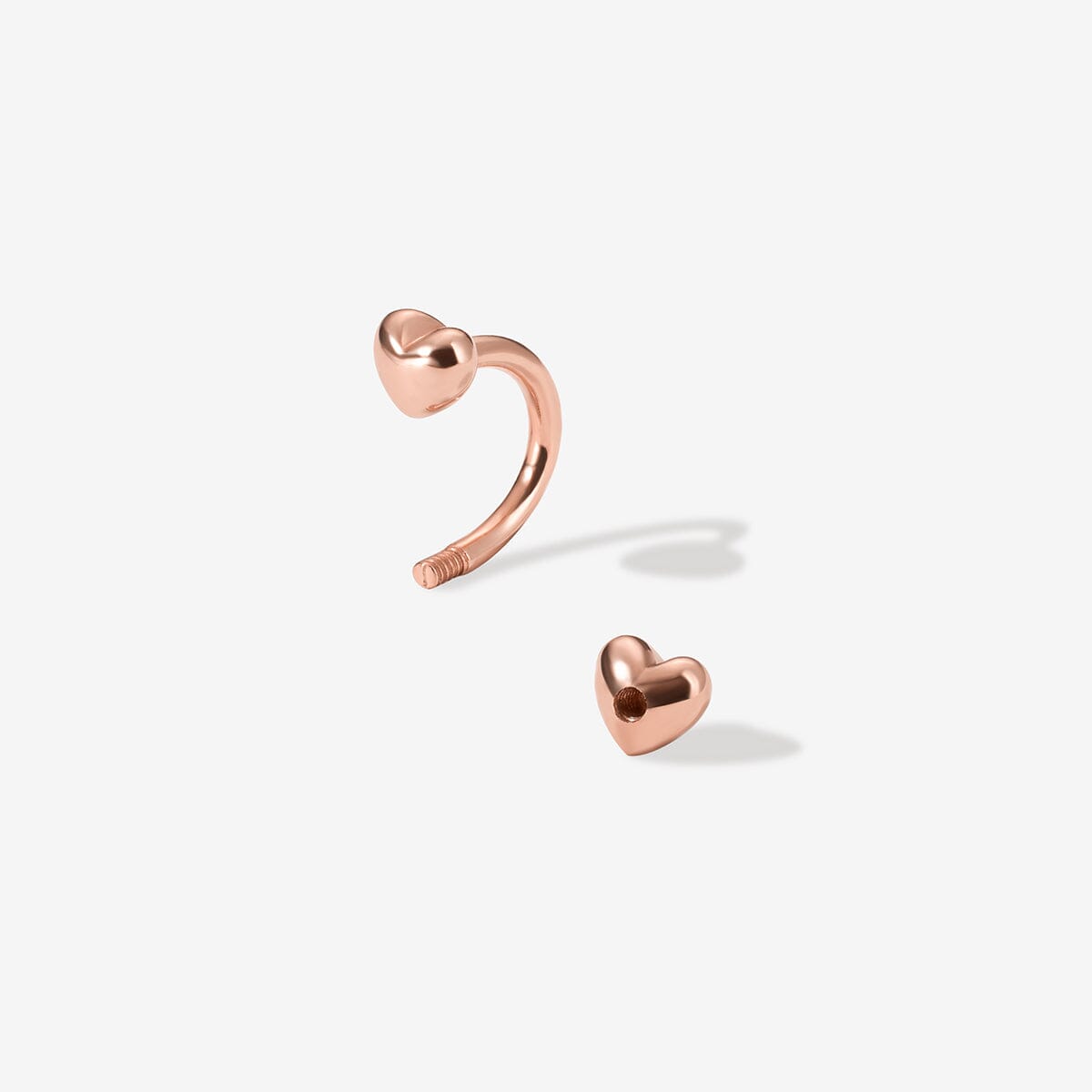 Fabio heart u hoop piercing