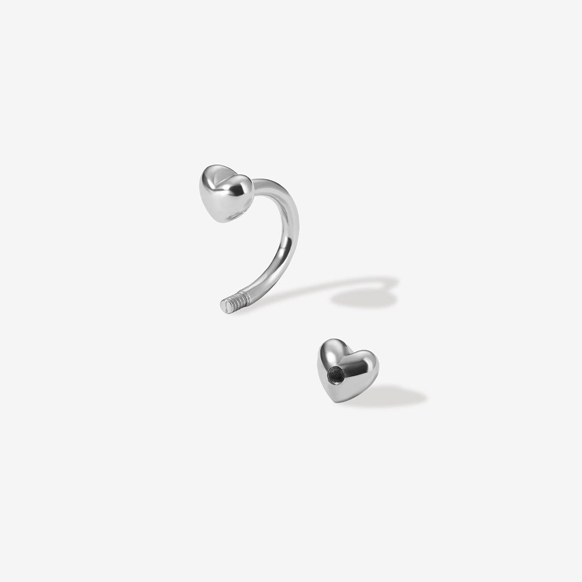 Fabio heart u hoop piercing