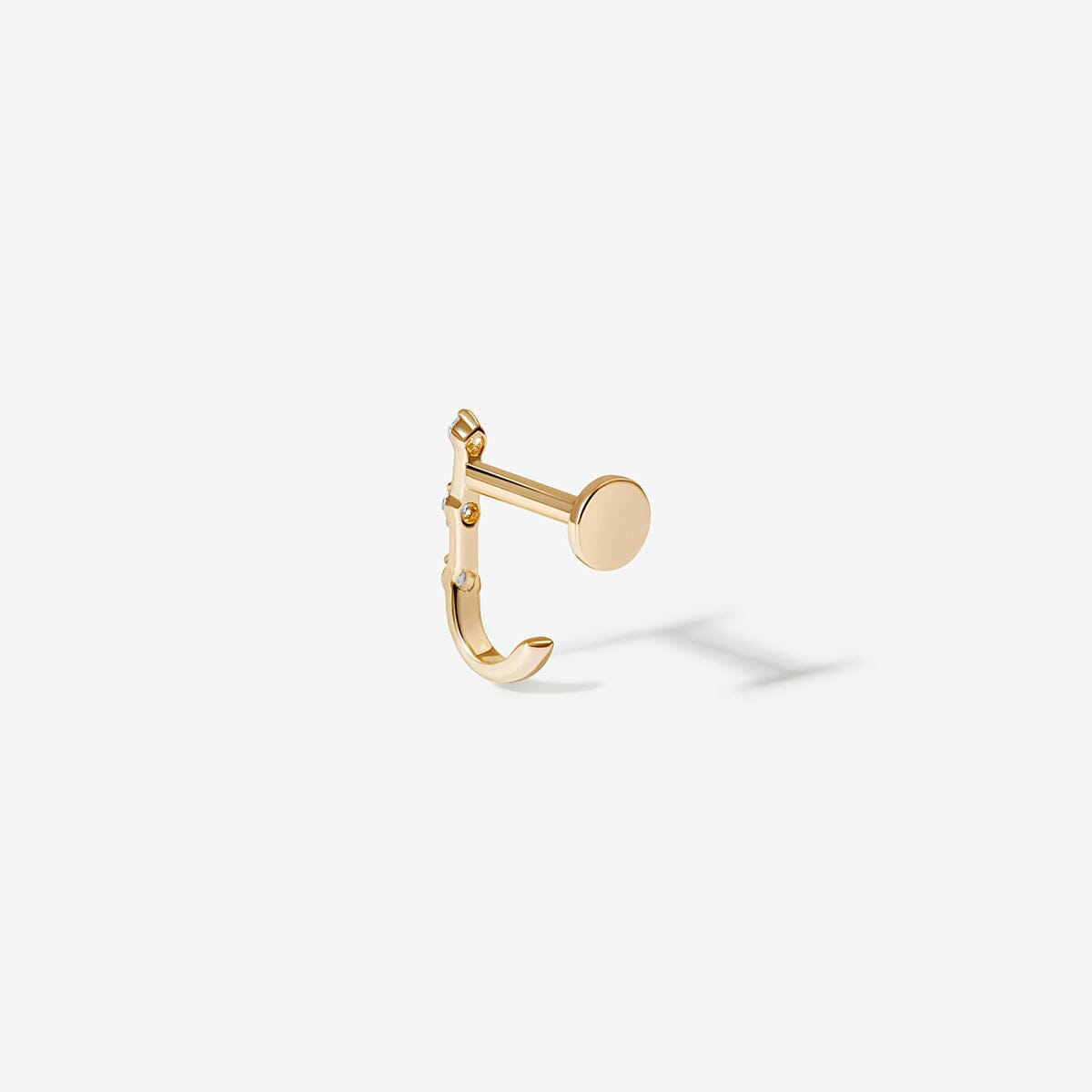 Lane diamond J piercing