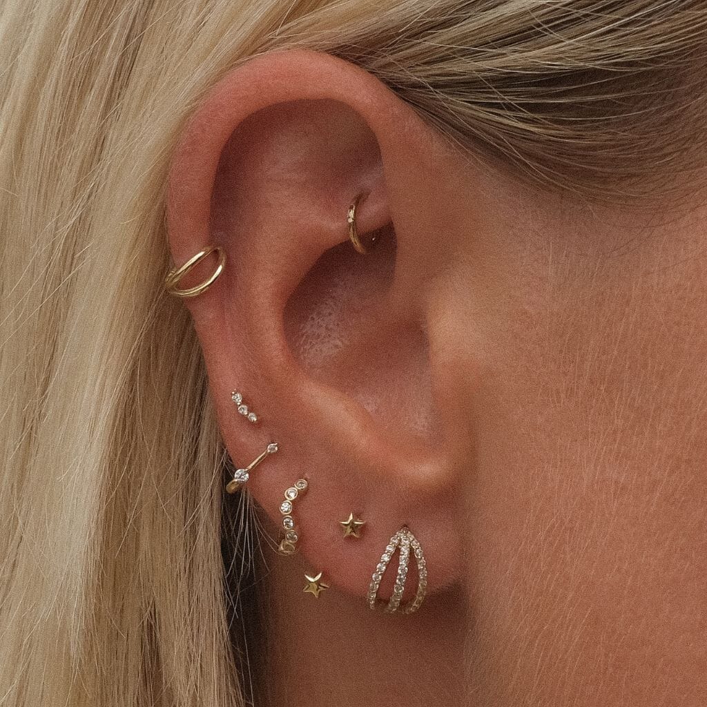 Lincoln star u hoop piercing