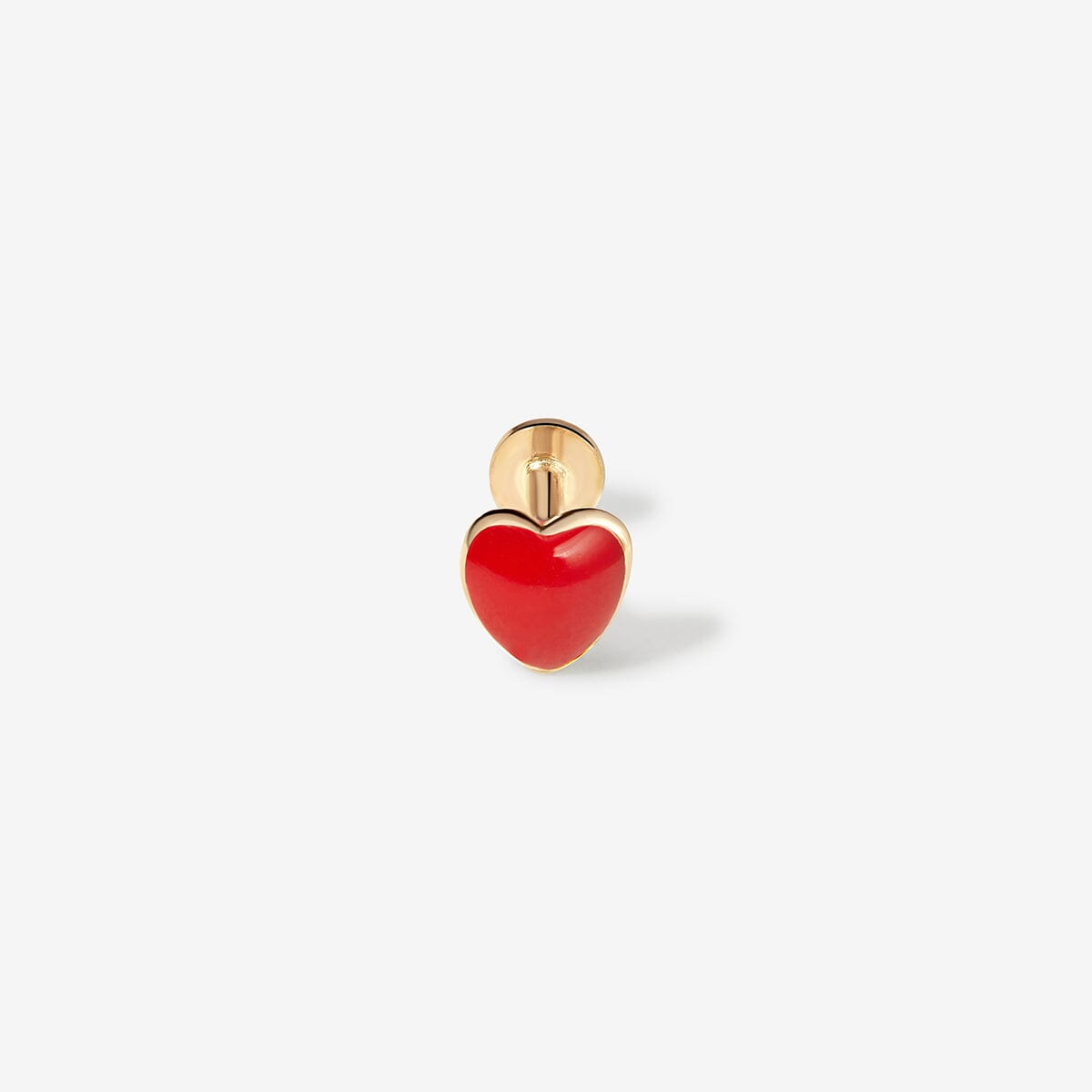 Saint red heart piercing