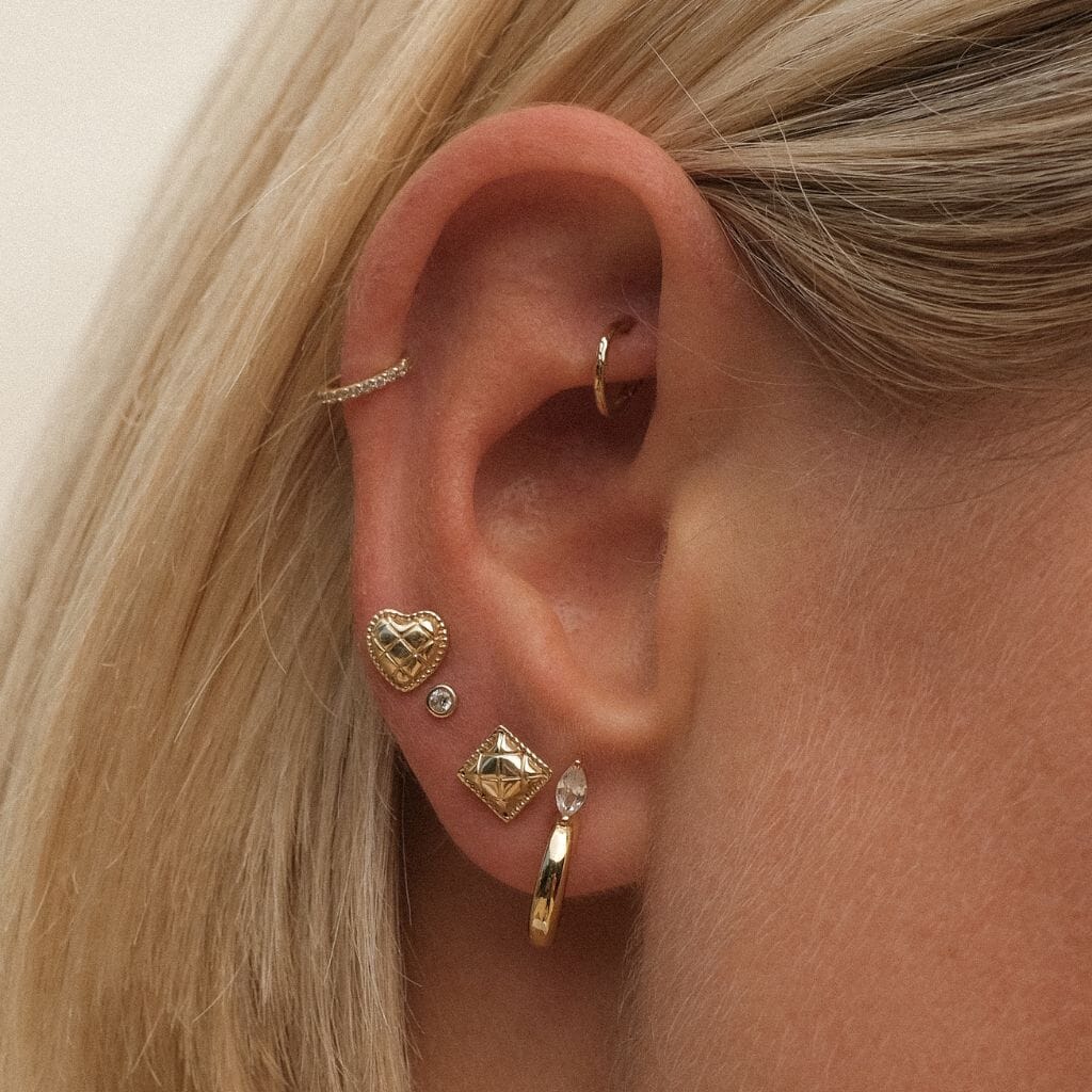 Collins heart quilted piercing