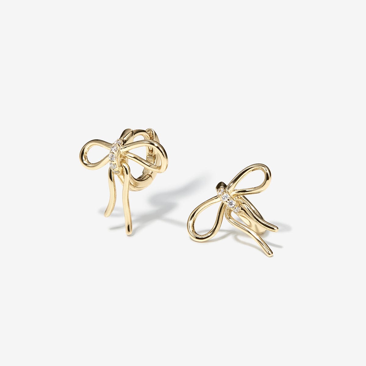 Cliff bow huggie earrings