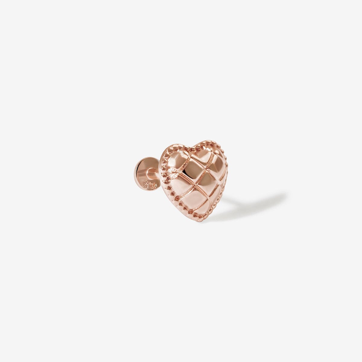 Collins heart quilted piercing