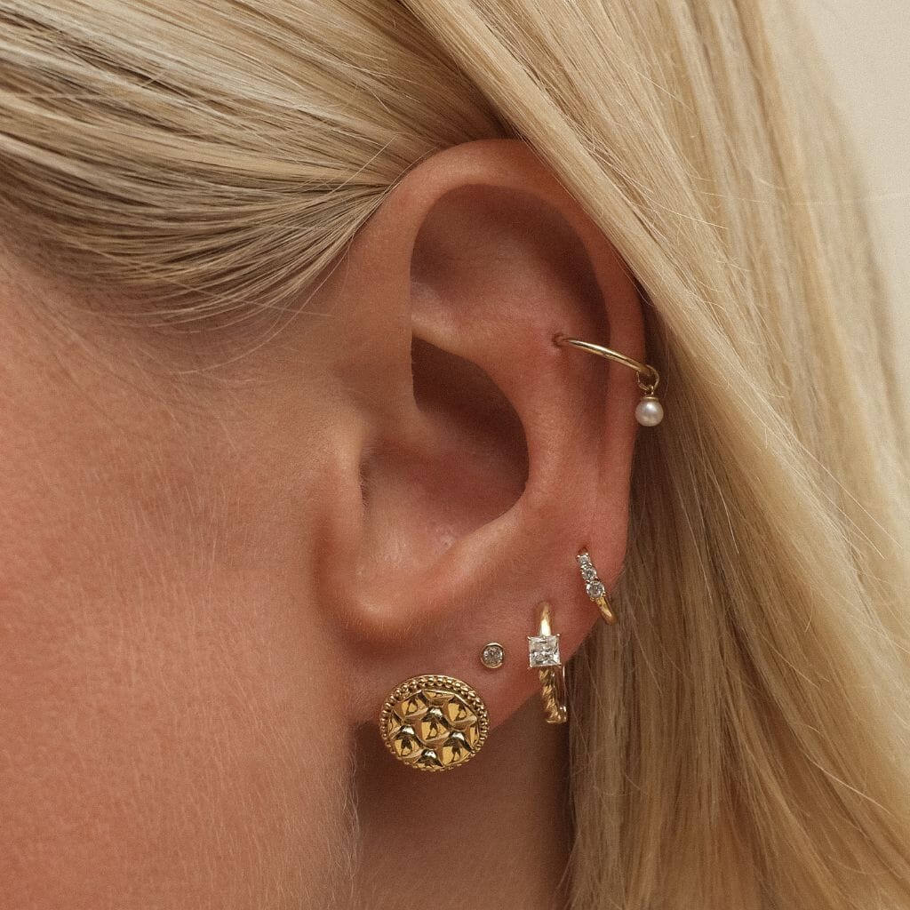 Johnnie round quilted huggie earrings