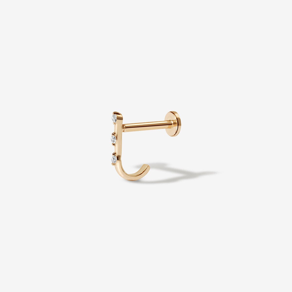 Lane diamond J piercing