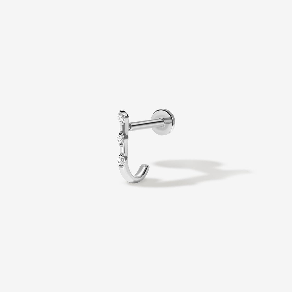 Lane diamond J piercing