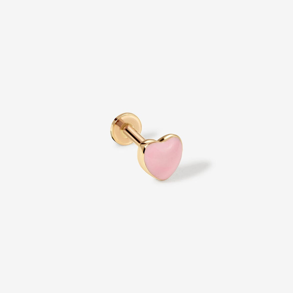 Saint pink heart piercing