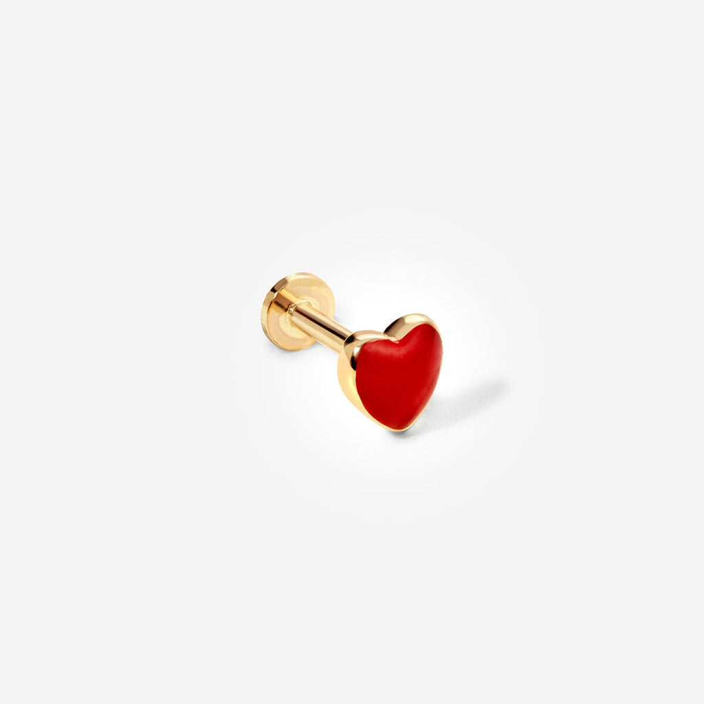 Saint red heart piercing
