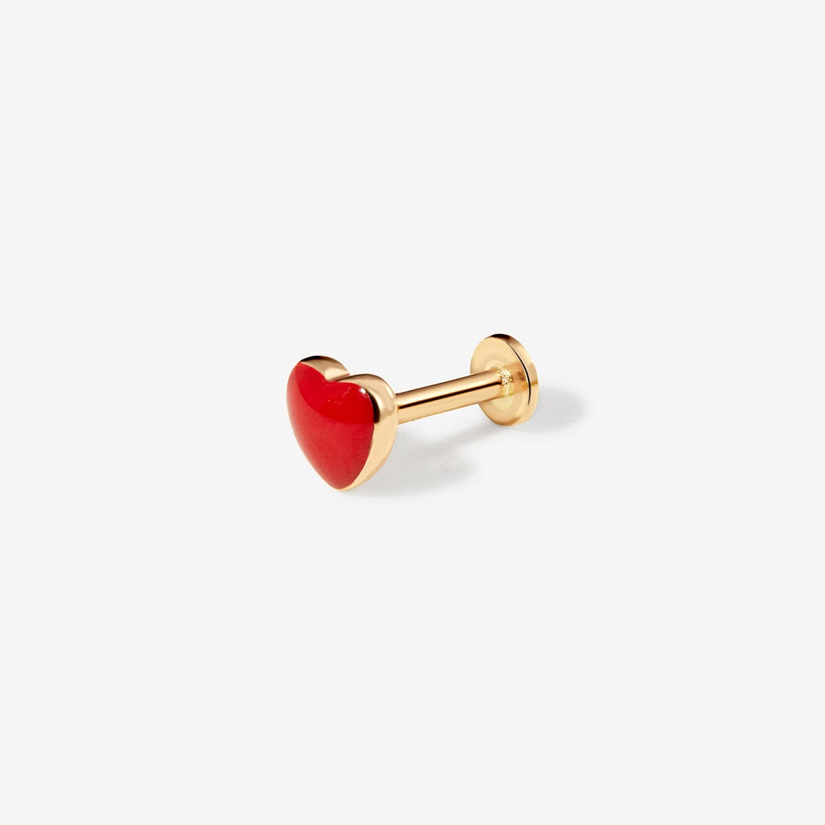Saint red heart piercing
