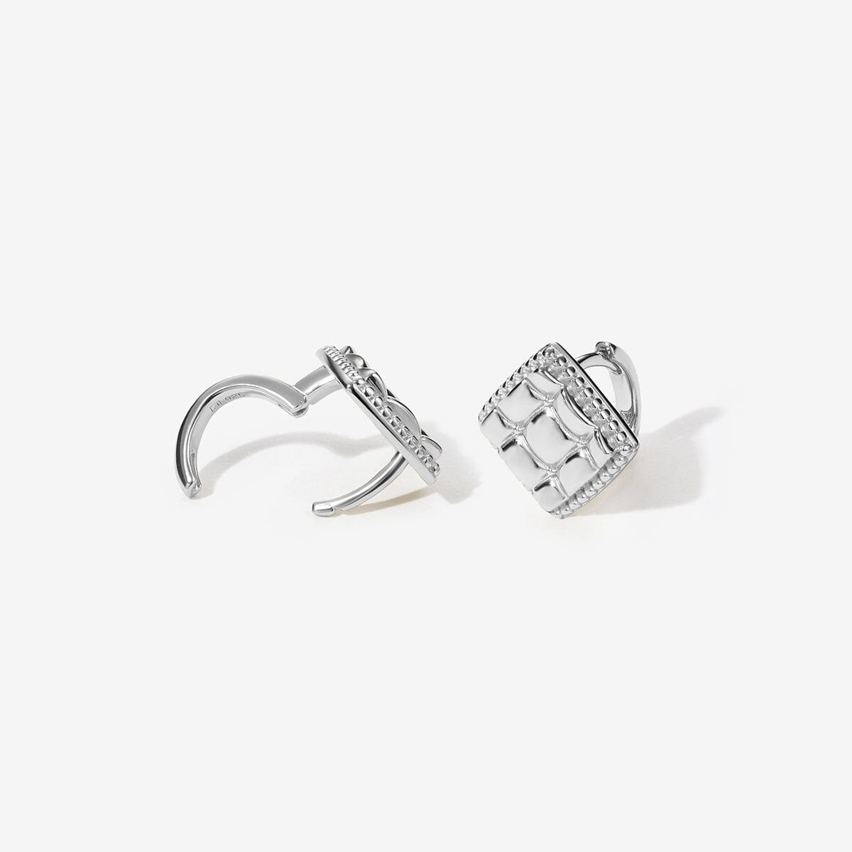 Tony diamond quilted huggie earrings